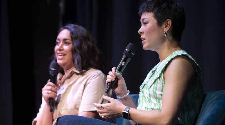 Two women presenting at an event 